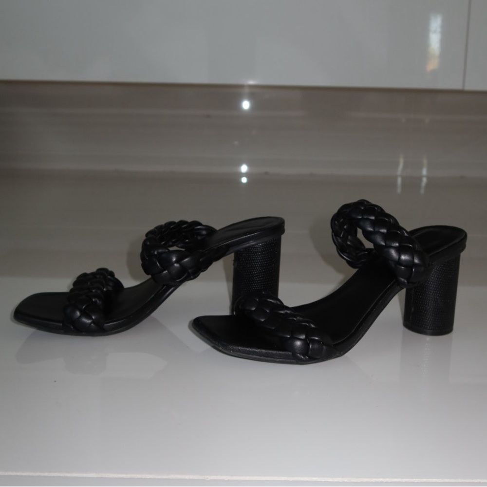 Black heel sandal with thick braided straps